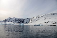 19C Getting Ready To Land On Cuverville Island From Zodiac With Mount Dedo Beyond On Quark Expeditions Antarctica Cruise
